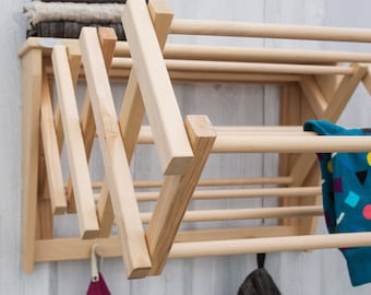 Wooden wall mounted foldable drying rack, airer with shelf and  Practical Nordic