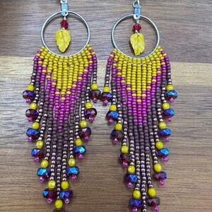 Fall themed magenta, yellow hawthorn, ox blood & pink beaded fringe hoop earrings with yellow leaf accents
