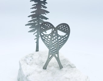 Snowshoeing on Vermont white marble. Truly one of a kind piece looking for a place of honor in a snowboarders nest. Table top art.
