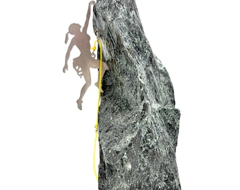 Female rock climber mounted on serpentine stone.  This will make a lovely display for office or home. Unique art. Climber display.
