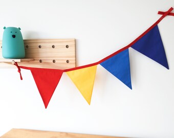 Red Yellow Blue and Purple Wiggles inspired fabric bunting banner flags party decoration. Custom length banners
