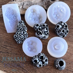 May include: A collection of silicone molds and cast resin pieces. The molds are white and circular or rectangular, with detailed interior designs. The cast pieces are black and white, resembling coral or rock formations. The logo "JESSAMA DESIGNS" is visible.