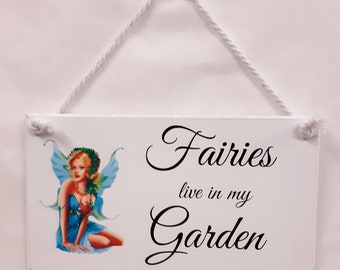Fairies Live in My Garden, Garden sign on a painted white board with Vinyl Script and printed decal. Wall plaque, Hanging Wall Sign.
