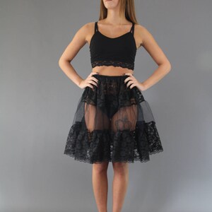 Lace and net petticoat skirt. Option to add a lining. Great to add a touch of volume to any outfit. This petticoat is black but also available in other colours.