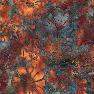 May include: Floral fabric with a batik-style design. The fabric features large, stylized orange flowers with dark outlines against a mottled blue and gray background. The flowers have intricate details and varying sizes.