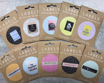 Kylie and the Machine Labels, Sew-In Labels, 8 Labels in Old Cardboard Packs, 6 Labels in New Vinyl Packaging