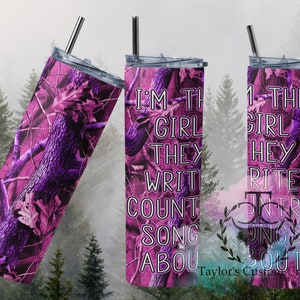 May include: Pink and purple camouflage tumbler with the text "I'm the girl they write country songs about".