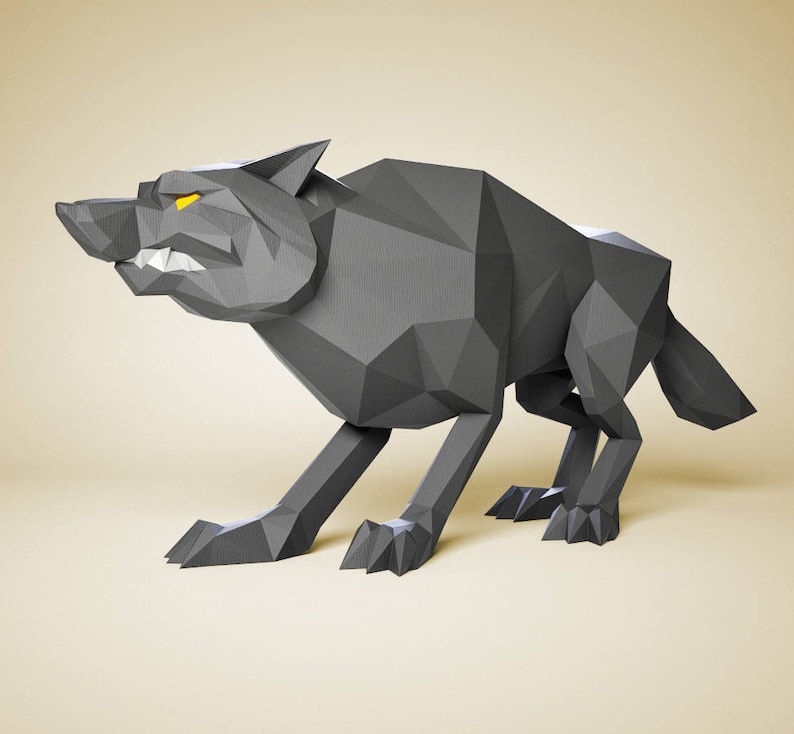 May include: A gray origami wolf with yellow eyes. The wolf is in a snarling pose with its mouth open and teeth showing. The wolf is made of paper and has a textured surface.