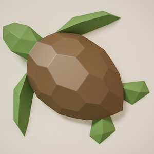 Może przedstawiać: Brązowa origami ż&oacute;łw z zielonymi papierowymi kończynami. Ż&oacute;łw jest wykonany ze złożonego papieru i ma geometryczny wz&oacute;r.