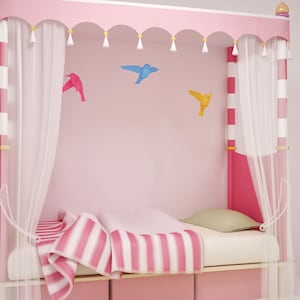 May include: A pink canopy bed with white curtains and a striped pink and white blanket. The bed has a white pillow and a small, green pillow. There are three paper bird cutouts on the wall behind the bed.