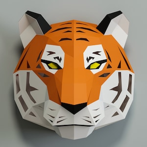 May include: A papercraft tiger mask with orange, black, and white stripes. The mask has a 3D effect and is made of folded paper.