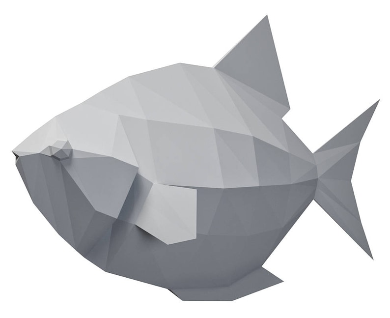 May include: A gray origami fish with a triangular fin and tail. The fish is made of paper and has a geometric design.