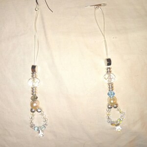 Genuine Swarovski crystals dangle earrings