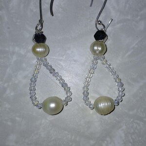 Genuine Swarovski crystals dangle earrings
