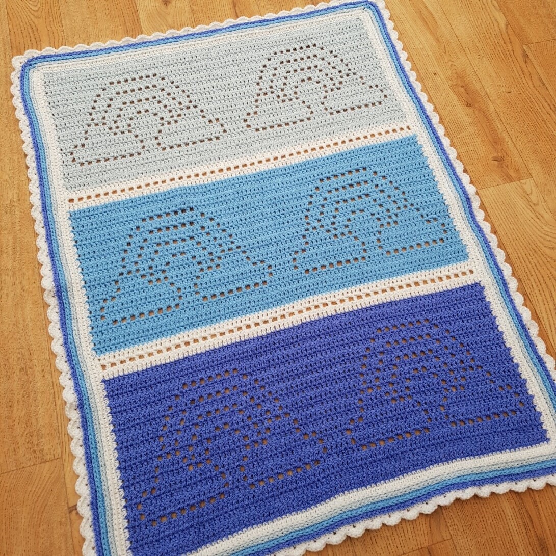 30 Rainbow Blanket Crochet Patterns to Brighten Baby Rooms, Throws, and Gift Giving 19 Clouds and Rainbows Filet Blanket Pattern