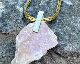 Raw rose quartz on a brass chain and alpaca bail