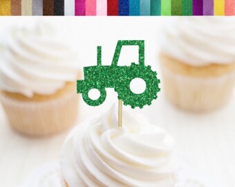 May include: Green glitter tractor cupcake topper. The topper is made of glitter cardstock and is ideal for a farm-themed party.