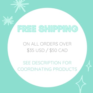 May include: A white circle with the text "FREE SHIPPING" in turquoise blue letters. The text "ON ALL ORDERS OVER $35 USD / $50 CAD" is below the main text. The text "SEE DESCRIPTION FOR COORDINATING PRODUCTS" is below the price information. The background is turquoise blue with turquoise blue stars.
