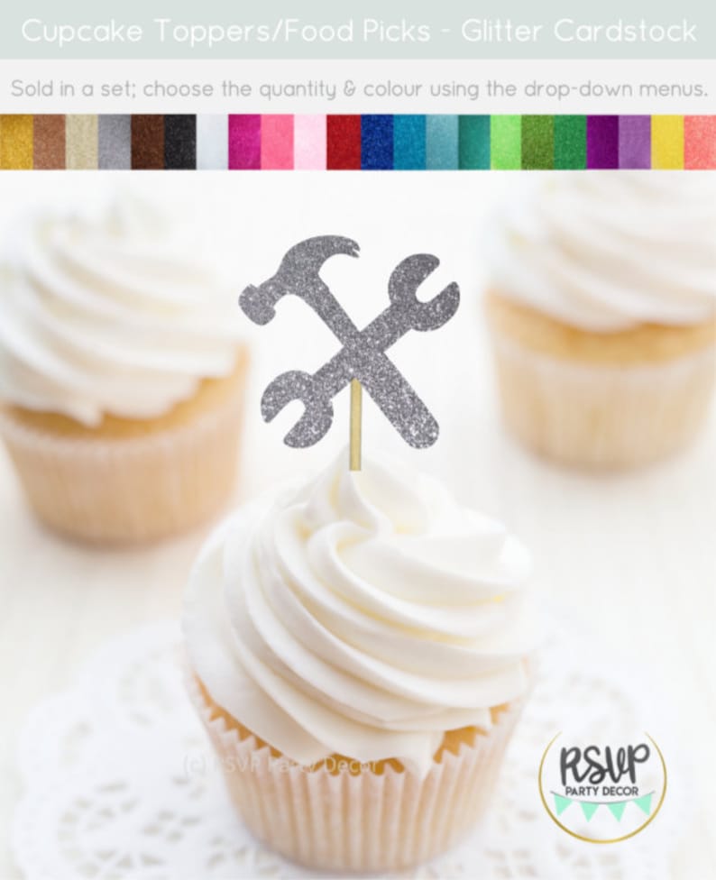 May include: Silver glitter cupcake topper with a hammer and wrench design. The topper is on a white cupcake with white frosting. The cupcake is on a white doily. The text "RSVP Party Decor" is on a gold circle with a green and white design.