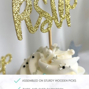May include: Gold glitter RSVP sign on a wooden pick. The sign is assembled on a sturdy wooden pick and is made of thick, anti-shed cardstock. The sign is professionally cut.