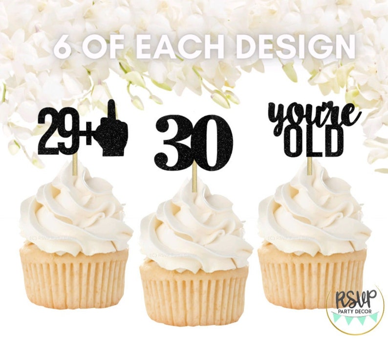 May include: Six cupcake toppers with black glitter text and designs. The toppers say "29 + middle finger", "30", and "you're old".