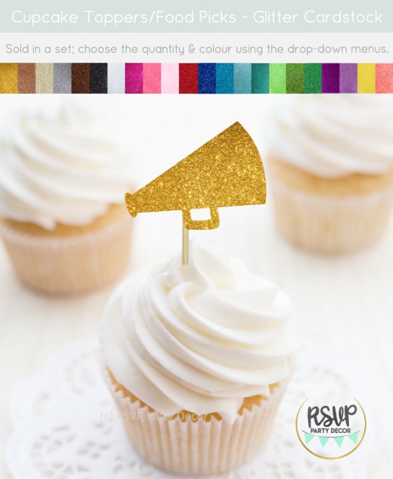 May include: A gold glitter cardstock megaphone cupcake topper on a cupcake with white frosting. The image shows three cupcakes, with the focus on the front cupcake. The text at the top says "Cupcake Toppers/Food Picks - Glitter Cardstock".