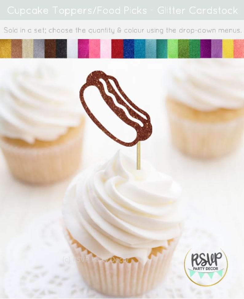 May include: A cupcake with white frosting and a glittery brown hot dog food pick. Two other cupcakes with white frosting are also visible. The image includes the text "Cupcake Toppers/Food Picks - Glitter Cardstock". The RSVP Party Decor logo is in the bottom right.