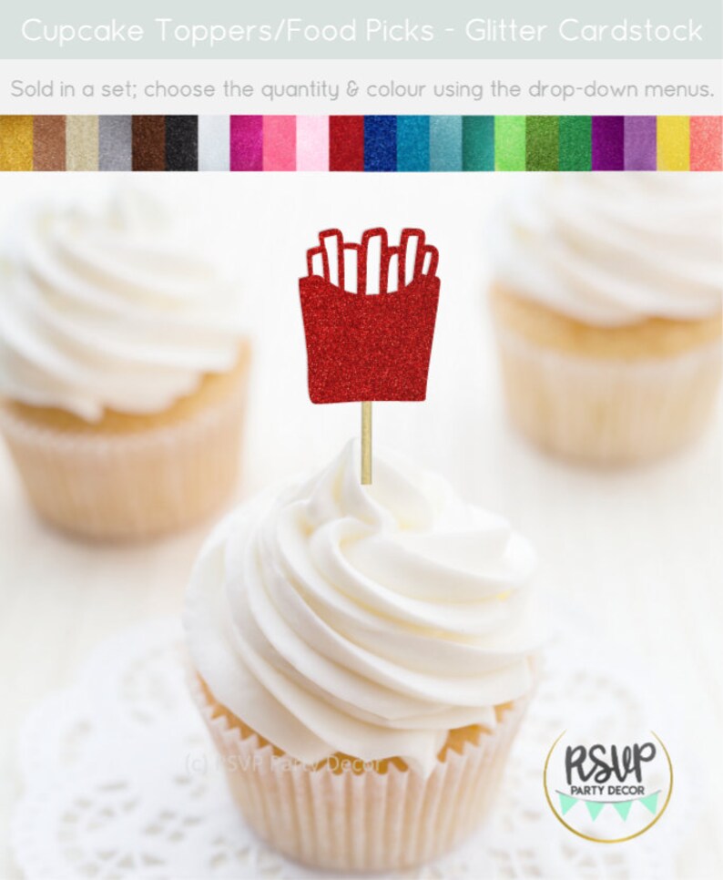 May include: Red glitter cupcake topper shaped like a box of french fries. The topper is on a wooden stick and is ready to be placed on a cupcake. The text "RSVP Party Decor" is visible in the bottom right corner of the image.