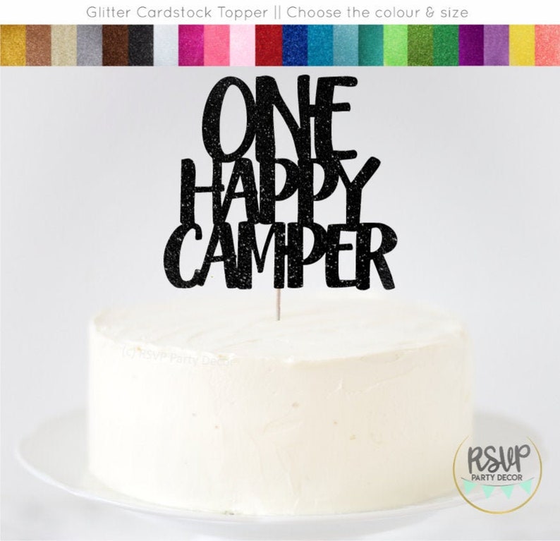 May include: Black glitter cardstock cake topper with the text "ONE HAPPY CAMPER".