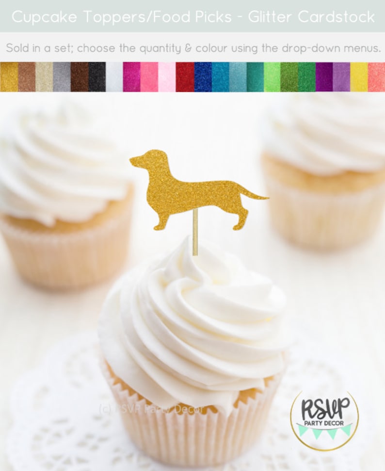 May include: Gold glitter dachshund cupcake topper. The topper is on a white cupcake with white frosting. The cupcake is on a white doily. The text "RSVP Party Decor" is visible in the bottom left corner of the image. The text "RSVP Party Decor" is visible in the bottom right corner of the image.