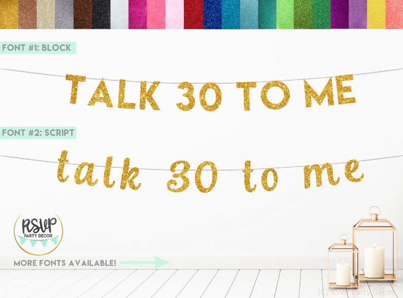 May include: Gold glitter banner with the text "TALK 30 TO ME" in block letters and "talk 30 to me" in script letters. The banner is hanging on a white wall. The text "MORE FONTS AVAILABLE!" is written below the banner.