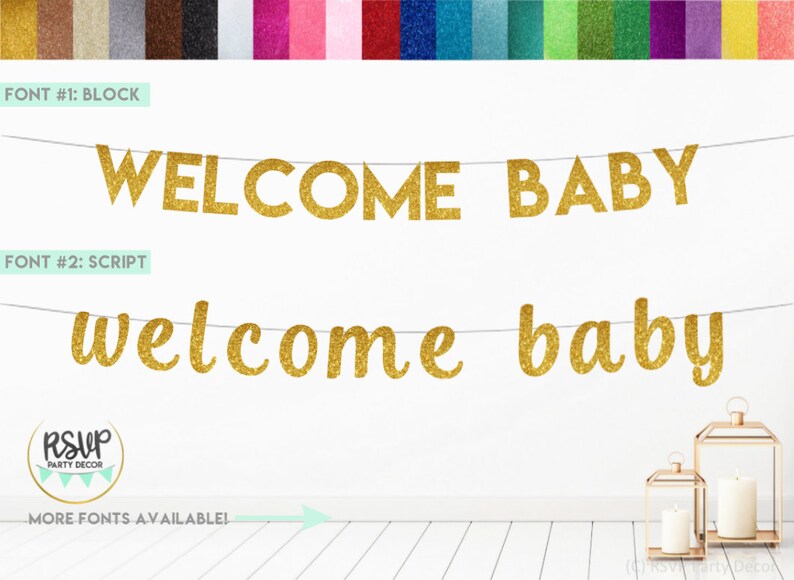 May include: Gold glitter welcome baby banner with two different font styles. The banner is hanging on a white wall with a wooden floor. The text on the banner reads "WELCOME BABY" in block letters and "welcome baby" in script letters.