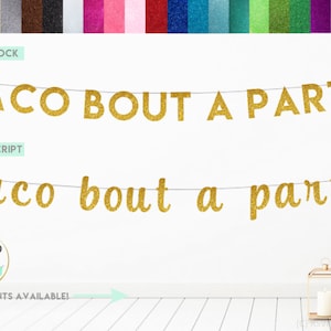 May include: Gold glitter banner with the text "Taco Bout A Party" in two different fonts. The banner is hanging on a white wall. The text is in block letters and script.