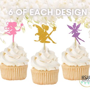 May include: Six cupcake toppers featuring glitter fairy silhouettes in pink, gold, and purple. The text "6 of each design" is visible at the top of the image.