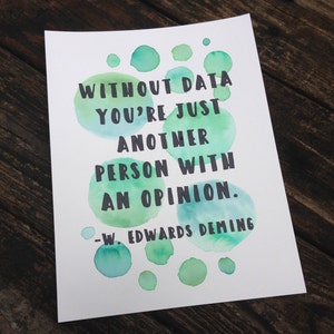 May include: A white background with a quote in black text surrounded by green and blue watercolor circles. The quote reads "Without data you're just another person with an opinion." -W. Edwards Deming