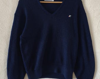 Jersey de punto vintage de cuello en V azul marino de Arnold Palmer / Estilo preppy de golf de los años 80 y 90.