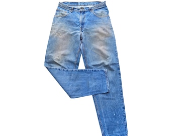Vintage Levi's 560 Jeans Loose Fit Tapered Leg Light Wash Denim Pants 90s Streetwear Baggy Style