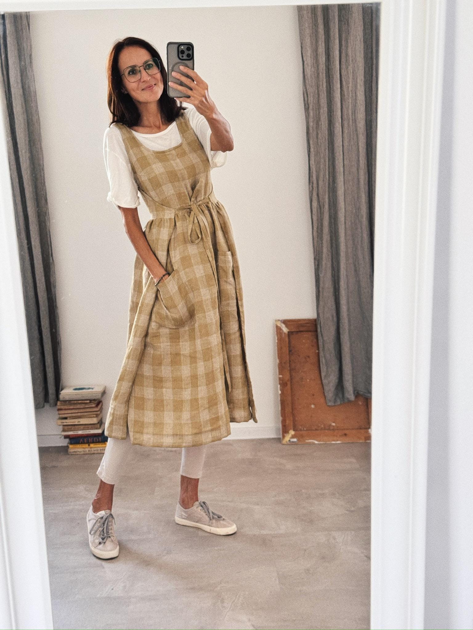 linen apron dress Lace Embroidery Available colours include olive green checkered and denim blue stripes V-Neck Linen Apron Dress |