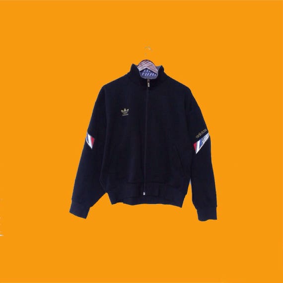 blue and yellow adidas tracksuit