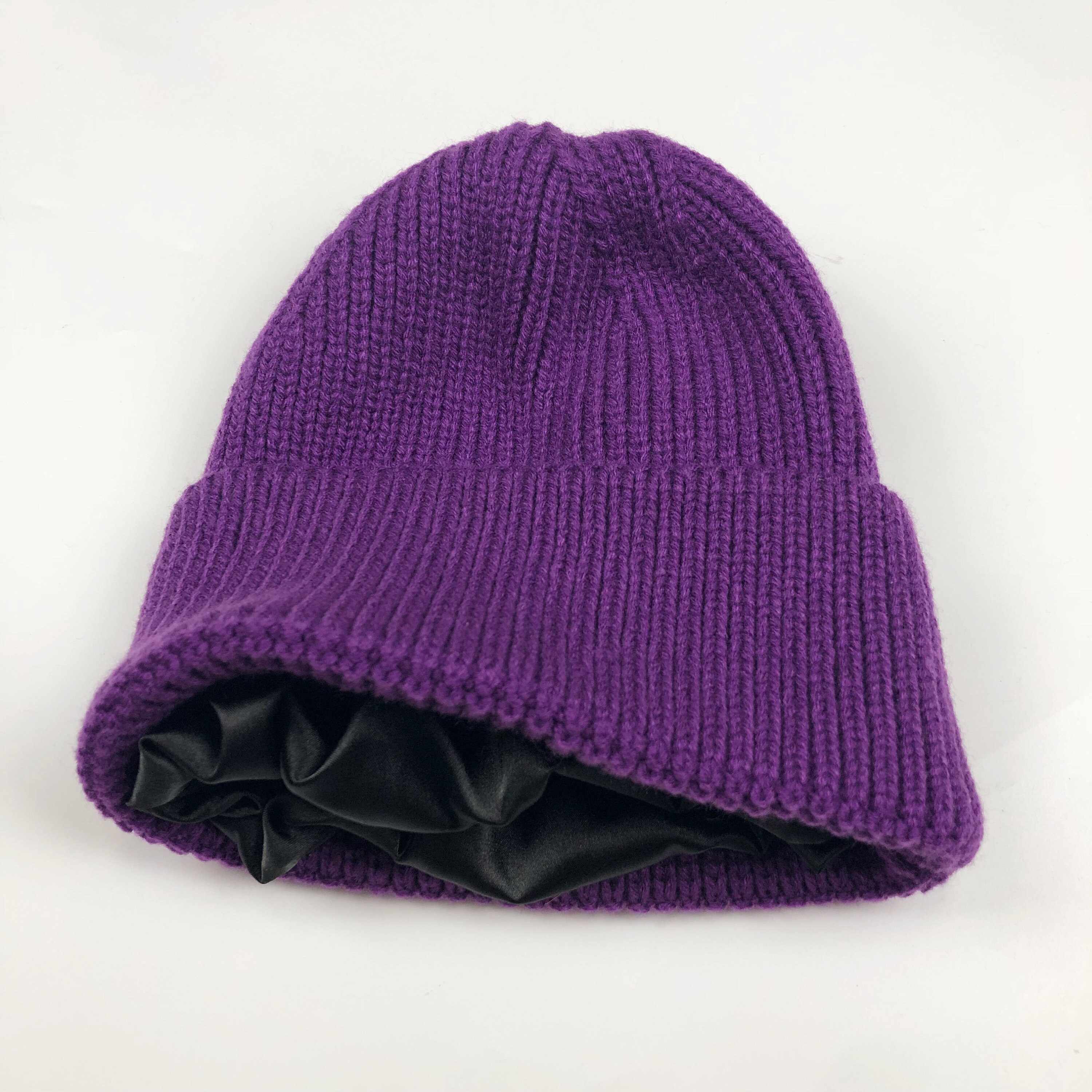 purple and white beanie