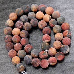 Matte Jasper Picasso beads, round shape, bead size 8mm, on 15.5 inch strand