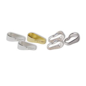 May include: A set of six silver and gold pendant bails. Two silver bails are marked "925" and two are marked "925". One gold bail is marked "925" and the other is marked "925".