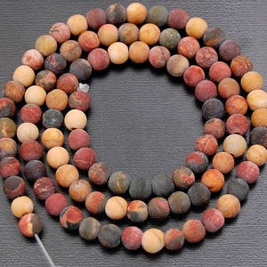 Matte Jasper Picasso beads, round shape, bead size 4mm, on 15.5 inch strand