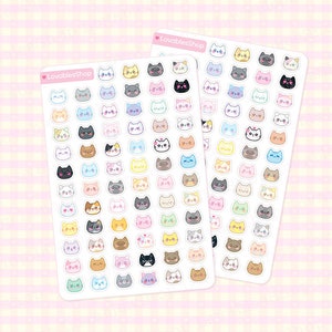 Op de afbeelding: Twee vellen doorzichtig stickerpapier met een verscheidenheid aan kleurrijke kattengezichten. Elk vel heeft 36 kattengezichten met verschillende uitdrukkingen en kleuren.