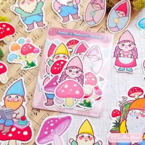 May include: A set of colorful gnome and mushroom stickers. The stickers feature gnomes with red, pink, and blue hats, and mushrooms with pink and white tops. The stickers are perfect for adding a touch of whimsy to your planner, journal, or laptop.