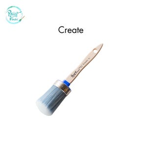 May include: A round-tipped paintbrush with a wooden handle and blue bristles. The brush has a silver ferrule and a blue base. The word "Create" is printed in black. The brush is angled to the right.