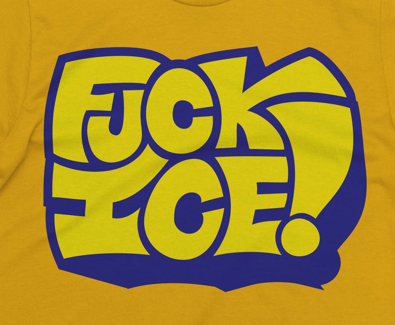May include: Mustard yellow t-shirt with a blue and yellow graphic that reads "F*CK ICE!" in a bold, stylized font. The text is outlined in blue, creating a striking contrast against the yellow background. The shirt is made of a soft material.