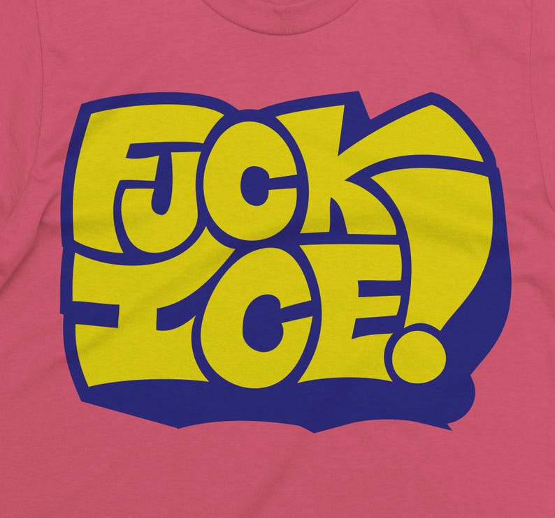 May include: Pink t-shirt with a yellow and blue graphic that reads "FUCK ICE!" in a bold, stylized font. The text is outlined in blue and set against a pink background.