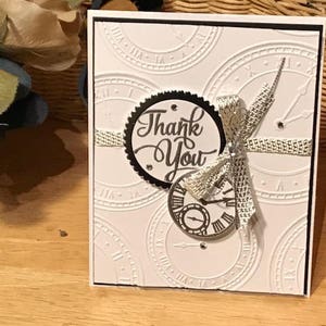 Tarjeta de agradecimiento con temática de reloj