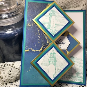 Lighthouse, carte d'anniversaire pop-up pliée en Z avec losanges
